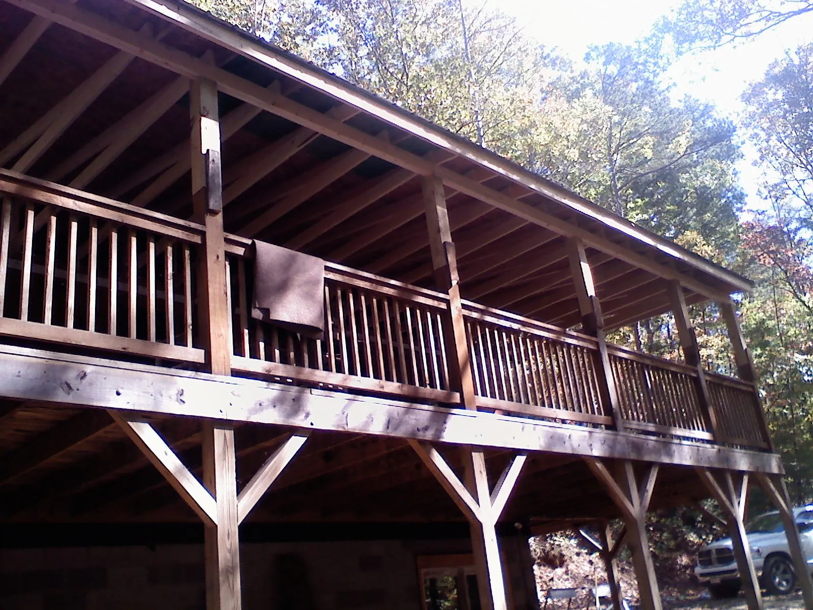 Timber framing under a new elevated porch and deck — Roof Leak Repair in Oslo by Roofing Brothers